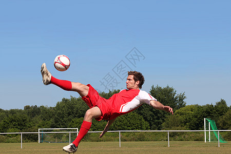 足球运动员肖像空气蓝色优胜者天空短裤娱乐玩家游戏树木闲暇图片