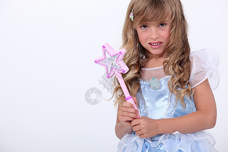 一个穿童话装的小女孩肖像戏服公主派对孩子丝绸乐趣裙子工作室狂欢小姑娘图片