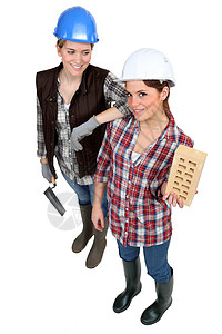 一支女商务人士队伍建设者职业橡皮衣领合伙雨靴团队安全女性人士图片