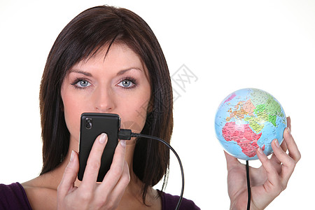 与世界相连讲话互联网技术说话圆形对讲机电话绳索行星女性图片