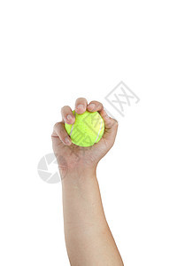 手边的网球在白色背景上被孤立图片