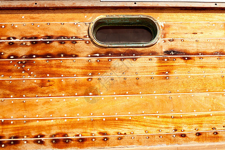 木质船体的门洞血管舷窗乳香治疗木板工艺港口帆船码头海洋图片