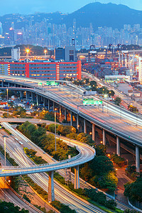 日落时货物码头和高速公路商业重量建筑港口贸易地球加载货运天空城市图片