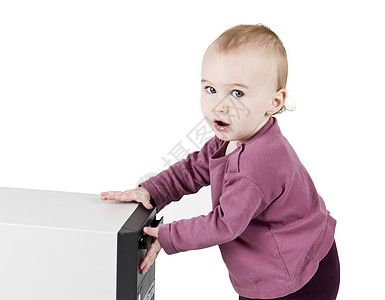 玩CD游戏的幼儿电脑孩子技术电子产品婴儿白色数据儿童托盘图片