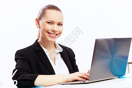 现任商业妇女套装技术工作桌子成人办公室微笑女性人士电脑图片