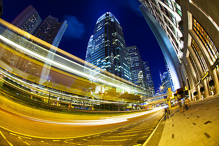 夜间在香港市中心的交通市中心景观建筑摩天大楼戏剧性公共汽车汽车城市运动运输图片