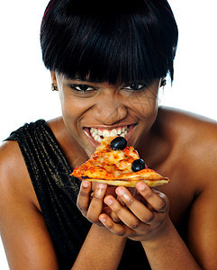 女人享受比萨饼女士馅饼午餐饮食女性垃圾小吃青少年食物快乐图片
