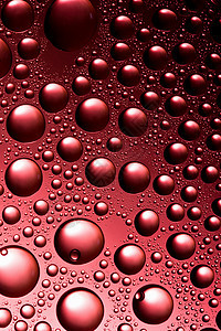 红色的水滴窗户环境雨滴水分液体宏观气泡圆圈反射玻璃图片