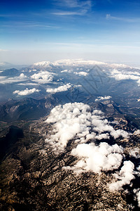 飞机上山岳的外观火鸡行星高度岩石环境爬坡天空天线阴霾地球图片