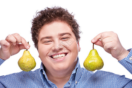 胖胖男孩和梨梨微笑享受圆形饮食男性水果食物味道男人图片