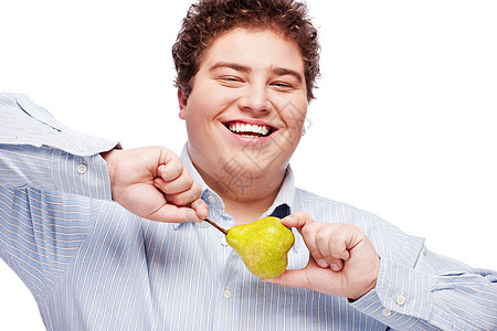 胖胖男孩和梨梨水果味道男性饮食微笑圆形食物男人享受图片