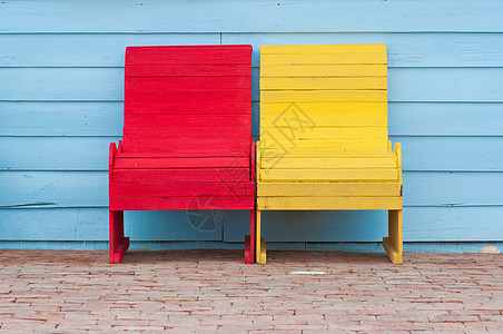 红色和黄色椅子座位奢华沙发家具墙纸装饰皮革装潢风格图片