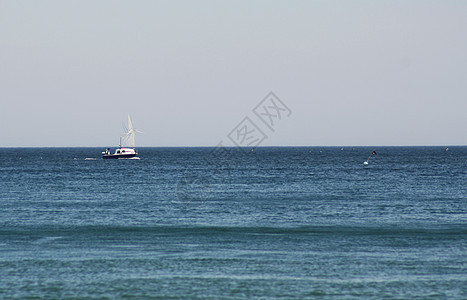 渔船海浪血管海景海岸线太阳蓝色海岸商业日落渔夫图片
