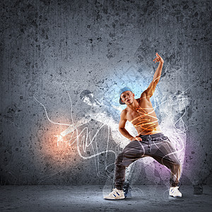 青年男子在有彩色线条的嬉舞中跳舞舞蹈家舞蹈有氧运动跳跃说唱演员身体行动芭蕾舞男生图片