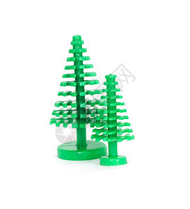 两棵塑料的圣诞树盒子锥体季节浆果装饰品丝带玩具枞树美丽植物图片