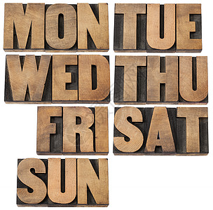 以木型计的每周天数木头字体印版拼贴画白色日历凸版图片