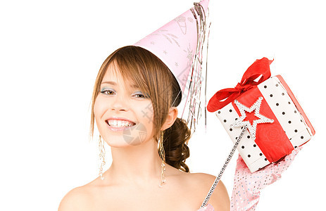 配有魔杖和礼品盒的少女乐趣享受微笑帽子喜悦女孩幸福黑发快乐庆典图片