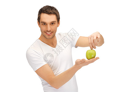 男人穿白衬衫 带绿苹果衬衫水果卫生快乐保健食物维生素活力营养早餐图片