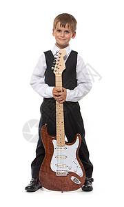 男孩拿着吉他细绳孩子岩石艺术童年乐趣青年微笑低音白色图片