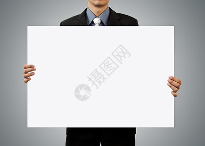 持有空白标志和手持白牌的商务人士图片