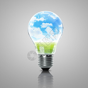 里面有电灯泡和蓝天空技术蓝色创新季节资源活力玻璃地球解决方案草地图片