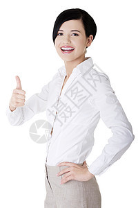 笑得开心的女商务人士 用拇指举起手势女孩喜悦工人微笑商业女士手指黑发人士学生图片