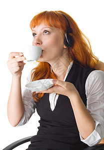 咖啡休息时间女孩微笑商业代理人人士杯子耳机女性嘴唇办公室图片