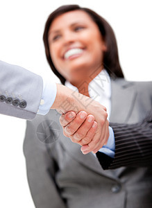 愉快的女商务人士看着她的伙伴握手 握手图片