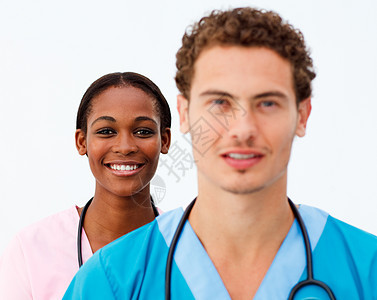 两个美丽的医生的肖像医院男性制服手术蓝色微笑商业女性外科保健图片