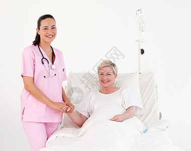 检查病人的女医生团队疾病幸福从业者工人助手卫生团结药品制服图片