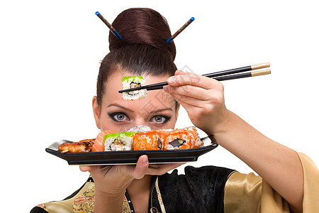 有寿司的年轻妇女图片