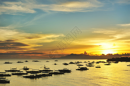 美丽的日落太阳旅行蓝色棕榈海岸线天空边缘橙子日出热带图片