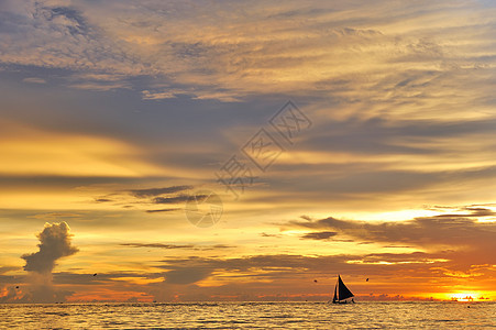 美丽的日落天空海岸线边缘地平线阳光海浪假期海景荒野热带图片