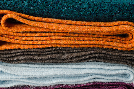 色彩多彩的围巾材料蓝色毛衣紫色运动衫命令服饰洗衣店纺织品服装图片