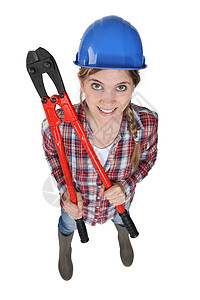 女性建筑工和装有螺栓管的女建筑商图片