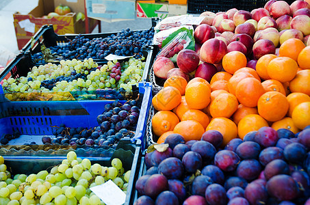 市场摊位上的水果热带饮食购物杂货店杂货店铺价格维生素营养食物图片