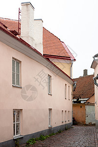 旧楼窗户路面白色街道粉色黑色建筑学黄色房子红色图片