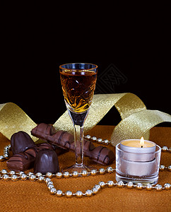 白兰地水晶杯黑色传统玻璃火焰酒精新年巧克力蜡烛庆典图片