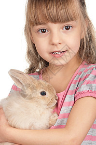 带兔子的小女孩耳朵宠物微笑哺乳动物幼儿园快乐女性女士婴儿女孩图片
