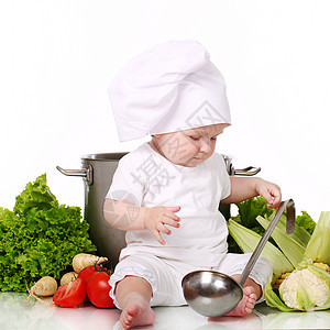 婴儿烹饪 锅和蔬菜加白菜厨房食物生长乐趣市场孩子平底锅沙拉营养厨师图片