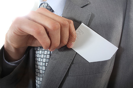 商务人士把名片从口袋里拿出来白色商务会议灰色手指男人商业关节网络领带图片
