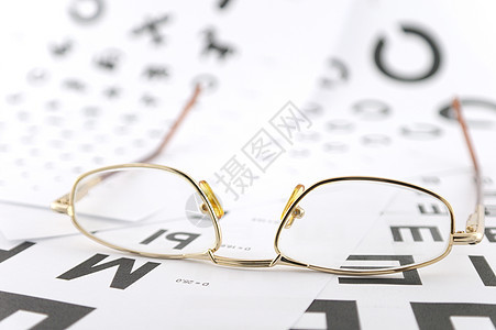 眼部血压比例上的眼镜保健验光桌子考试验光师镜片眼睛字母诊断卫生图片