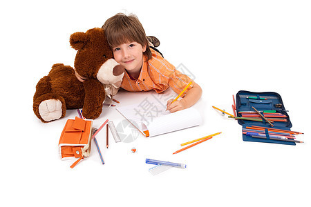 带笔记本和泰迪熊的快乐小男孩追求幼儿园学校乐趣智慧喜悦学生童年微笑好奇心图片