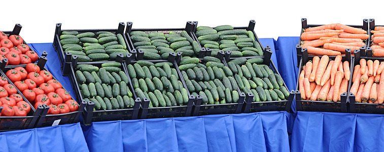 蔬菜市场上箱装蔬菜的蔬菜店铺杂货绿色红色营养素季节食物活力营养黄瓜图片