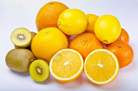 切水果柑橘水果白色绿色橙子蔬菜黄色香橼果汁圆形食物柠檬背景