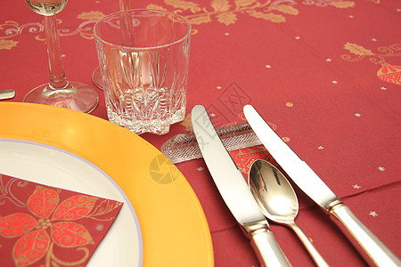圣诞节表格餐具红色季节性派对假期餐厅桌子玻璃黄色酒杯图片