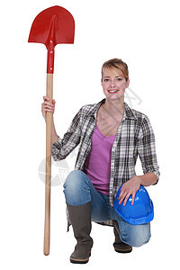 拿着铁铲的女人管道女性工作商业承包商维修劳动帽子眼镜建设者图片