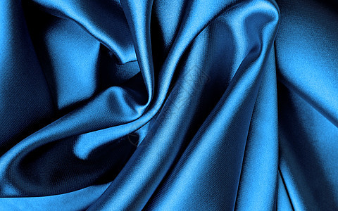 蓝丝婚礼帆布丝绸折痕折叠窗帘投标布料蓝色织物背景图片