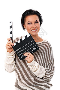 年轻快乐的女士拿着一个掌盘电影演员黑发幸福相机青年成人黑板粉笔学生图片