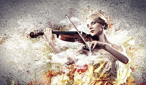 迷人的女子玩小提琴工作学生热情乐器女孩小提琴家天赋学校学习创造力图片